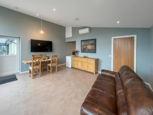 Μια τηλεόραση ή/και κέντρο ψυχαγωγίας στο Grey Rocks Apartment