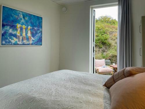 Ένα ή περισσότερα κρεβάτια σε δωμάτιο στο Holiday Home With Panoramic Views On Fanø