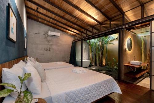a bedroom with a bed in a room at AN Village 1 in Vung Tau