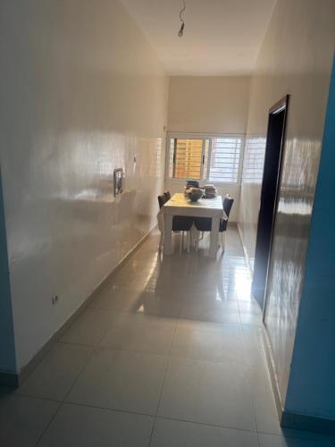 Ένα ή περισσότερα κρεβάτια σε δωμάτιο στο Petit mbao villa