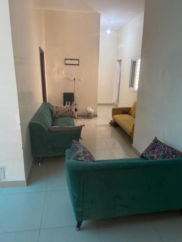 Χώρος καθιστικού στο Petit mbao villa