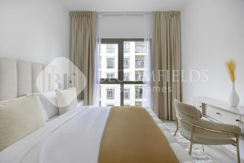 Ένα ή περισσότερα κρεβάτια σε δωμάτιο στο Bloomfields Cozy 1br Apt Town Square