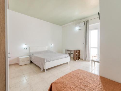 Katil atau katil-katil dalam bilik di Villa Bludea - Salento