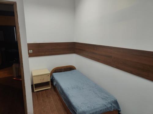 En eller flere senge i et værelse på Noclegi Juliusz Slowacki 6