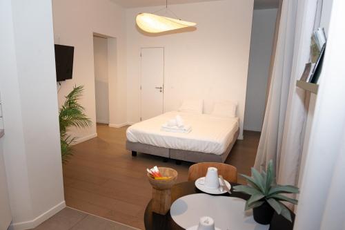 Ένα ή περισσότερα κρεβάτια σε δωμάτιο στο Studio 402 Avenue Louise