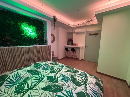 a bedroom with a bed and a large window at Love room - 5 min train station - Jacuzzi - Netflix - Clim in Avignon