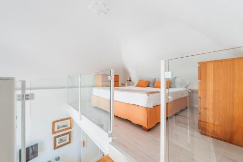 Poschodová posteľ alebo postele v izbe v ubytovaní Palazzo Sassi