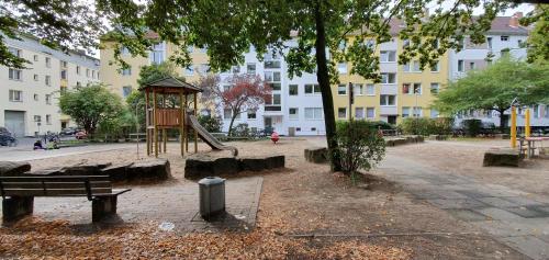 a park with a playground with a swing at Dein Chill-Space mitten in Hannover in Hannover