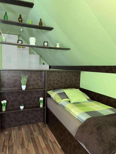 Llit o llits en una habitació de Mecsek apartman