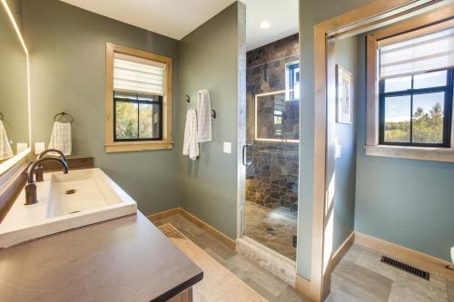 a bathroom with a sink and a shower at 3 Mi to Dtwn Red Lodge Mtn-View Home with Hot Tub in Red Lodge