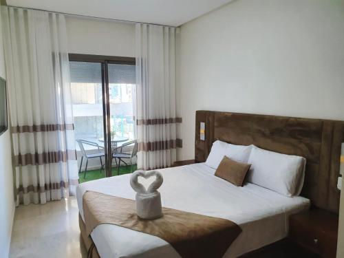 Ένα ή περισσότερα κρεβάτια σε δωμάτιο στο Borj rayhan 2