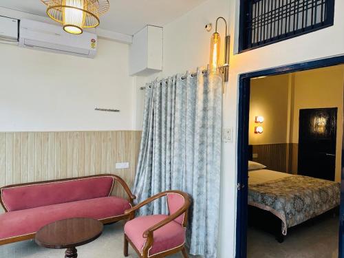 Postel nebo postele na pokoji v ubytování Avani