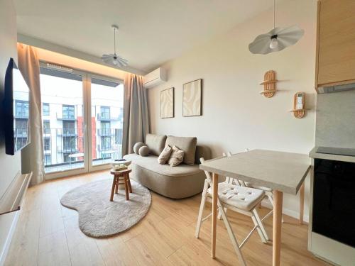Komfortowy apartament przy plaży z klimatyzacją i parkingiem