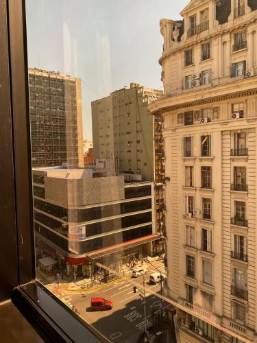 a view of a city street from a window at ATLAS TOWER HOTEL in Buenos Aires