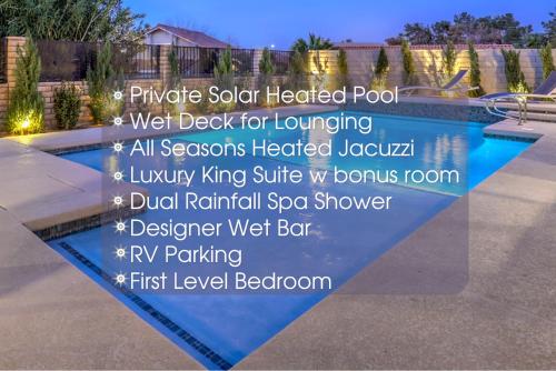 une photo d'une piscine avec une annonce pour une maison dans l'établissement Sunset Swim, Luxury Vegas Villa with Pool, Hot Tub, à Las Vegas
