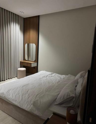 Ένα ή περισσότερα κρεβάτια σε δωμάτιο στο استديو ضيافة البرج