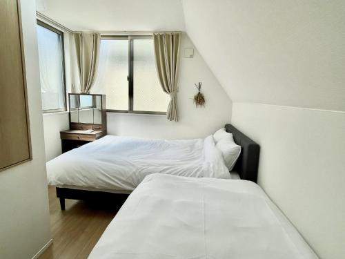 Voodi või voodid majutusasutuse Bisk Park Higashijujo - Vacation STAY 83637v toas