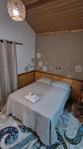 Postel nebo postele na pokoji v ubytování Chalé Elis 400m do centro - Serra do Cipó