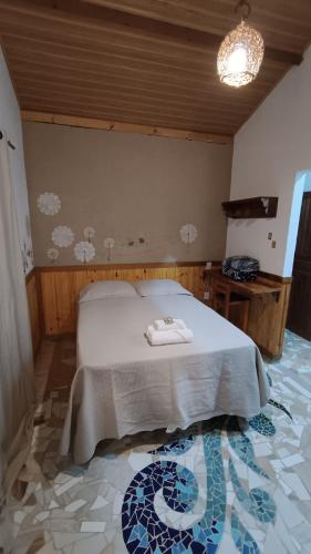 Postel nebo postele na pokoji v ubytování Chalé Elis 400m do centro - Serra do Cipó