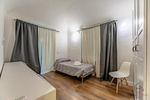 Ένα ή περισσότερα κρεβάτια σε δωμάτιο στο The Heart of Savona A - Cruise 2 min - AC - WiFi