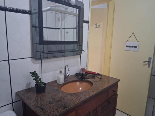 Bilik mandi di Pousada Familiar Mi Casa Su Casa