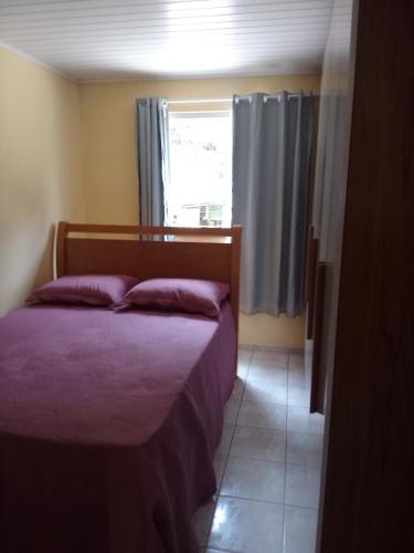 Postel nebo postele na pokoji v ubytování Casa da Claudia - Santa Teresa