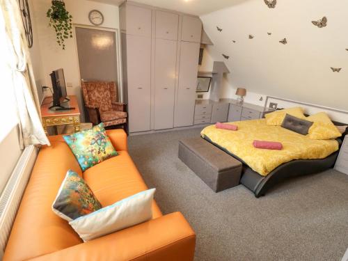 Posezení v ubytování Peartree Cottage