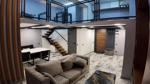 Coin salon dans l'établissement Tashkent City Apartments D11