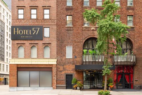 a brick building with a sign on it at Hotel 57 in New York