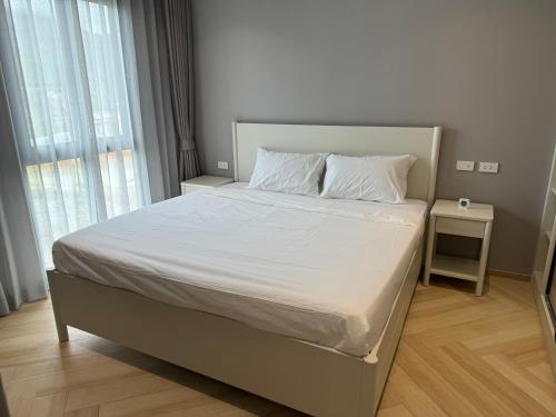 Voodi või voodid majutusasutuse Апартаменты у океана пляж Бангтао Title Legendary Bangtao toas