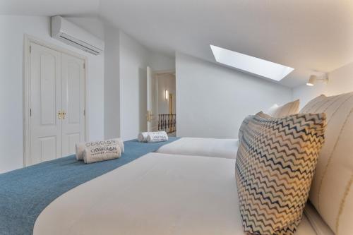 Ένα ή περισσότερα κρεβάτια σε δωμάτιο στο Obsidian Canarysol Los Cristianos