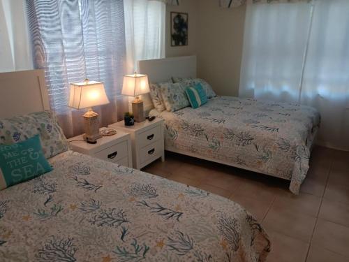 Ένα ή περισσότερα κρεβάτια σε δωμάτιο στο Madeira Bonita