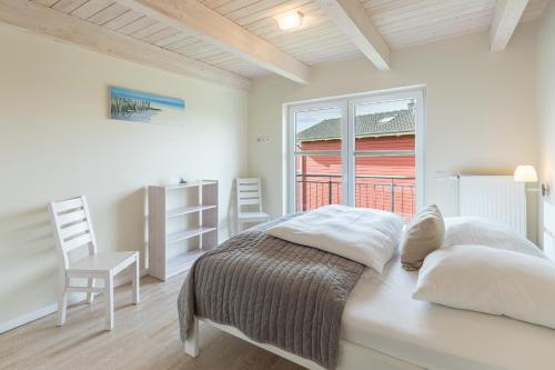 Postel nebo postele na pokoji v ubytování Steife Brise