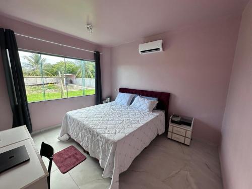 Postel nebo postele na pokoji v ubytování Chic Beach House