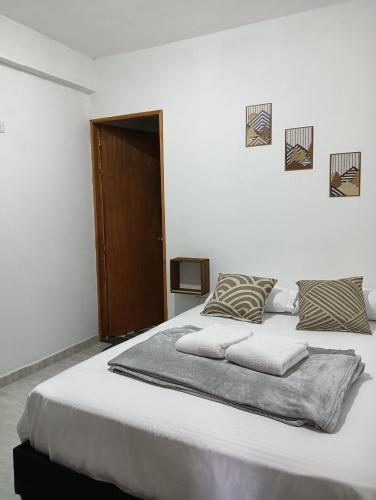 Postel nebo postele na pokoji v ubytování Apartamento en jardin