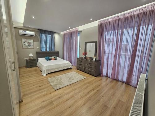 Ένα ή περισσότερα κρεβάτια σε δωμάτιο στο Green house