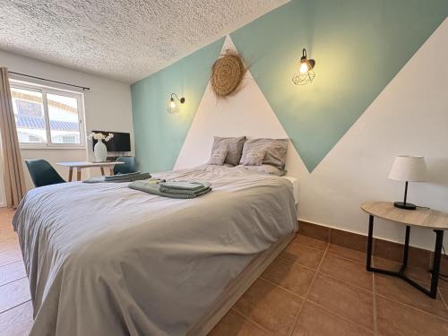 En eller flere senge i et værelse på La casa de familia