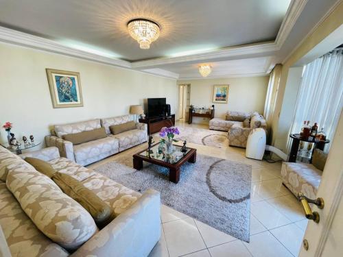 Posezení v ubytování Quarto De Luxe Silver