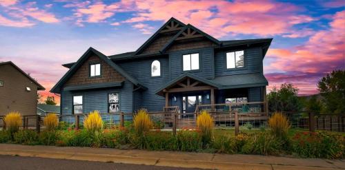 a black house with a black roof at Mountain Lodge Oasis w Hot Tub-Rio Grande Trail in Carbondale