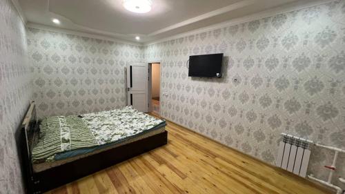 TV a/nebo společenská místnost v ubytování 3-комнатная квартира в Андижане