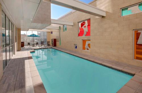 a swimming pool in a building at Hyatt Place Glendale/Los Angeles in Glendale