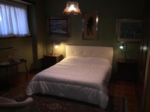 Postel nebo postele na pokoji v ubytování Grottaferrata Haven