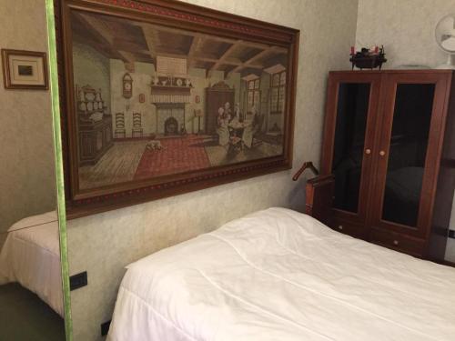 Postel nebo postele na pokoji v ubytování Grottaferrata Haven