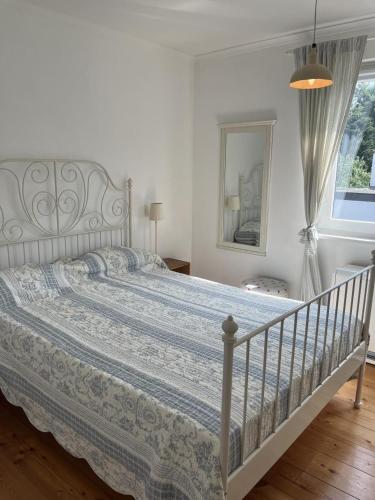 Postel nebo postele na pokoji v ubytování Dat smugge Hus in Maasholm-Bad