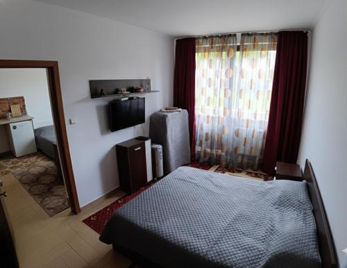 Ένα ή περισσότερα κρεβάτια σε δωμάτιο στο One-bedroom apartment in Cedar Lodge 3