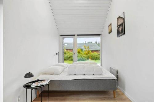 Postel nebo postele na pokoji v ubytování JB362-Brovst-Kronvildtvej-136