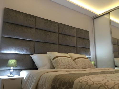 Postel nebo postele na pokoji v ubytování Touched VIP Zadar