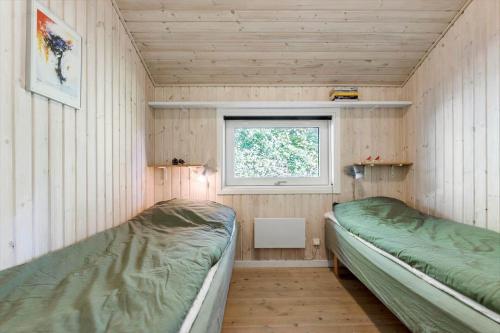 Postel nebo postele na pokoji v ubytování 8872-Glesborg-Hybenvaenget-6