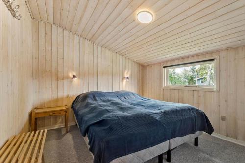 Postel nebo postele na pokoji v ubytování 8870-Glesborg-Svinget-12