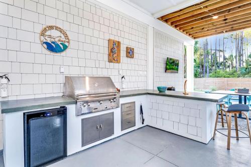 a kitchen with a stove and a counter top at Endless Summer St George 4Bed 3 5 Bath with POOL in St. George Island